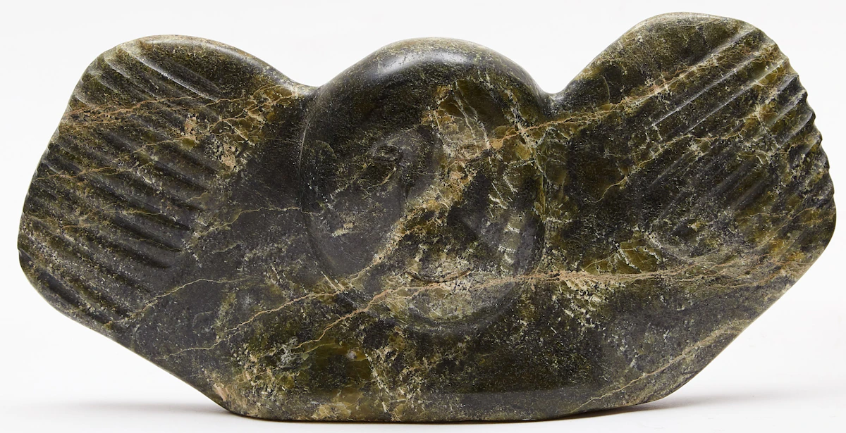 Unidentified Inuit Artist, Owl Transformation (Human Face with Wings), stone