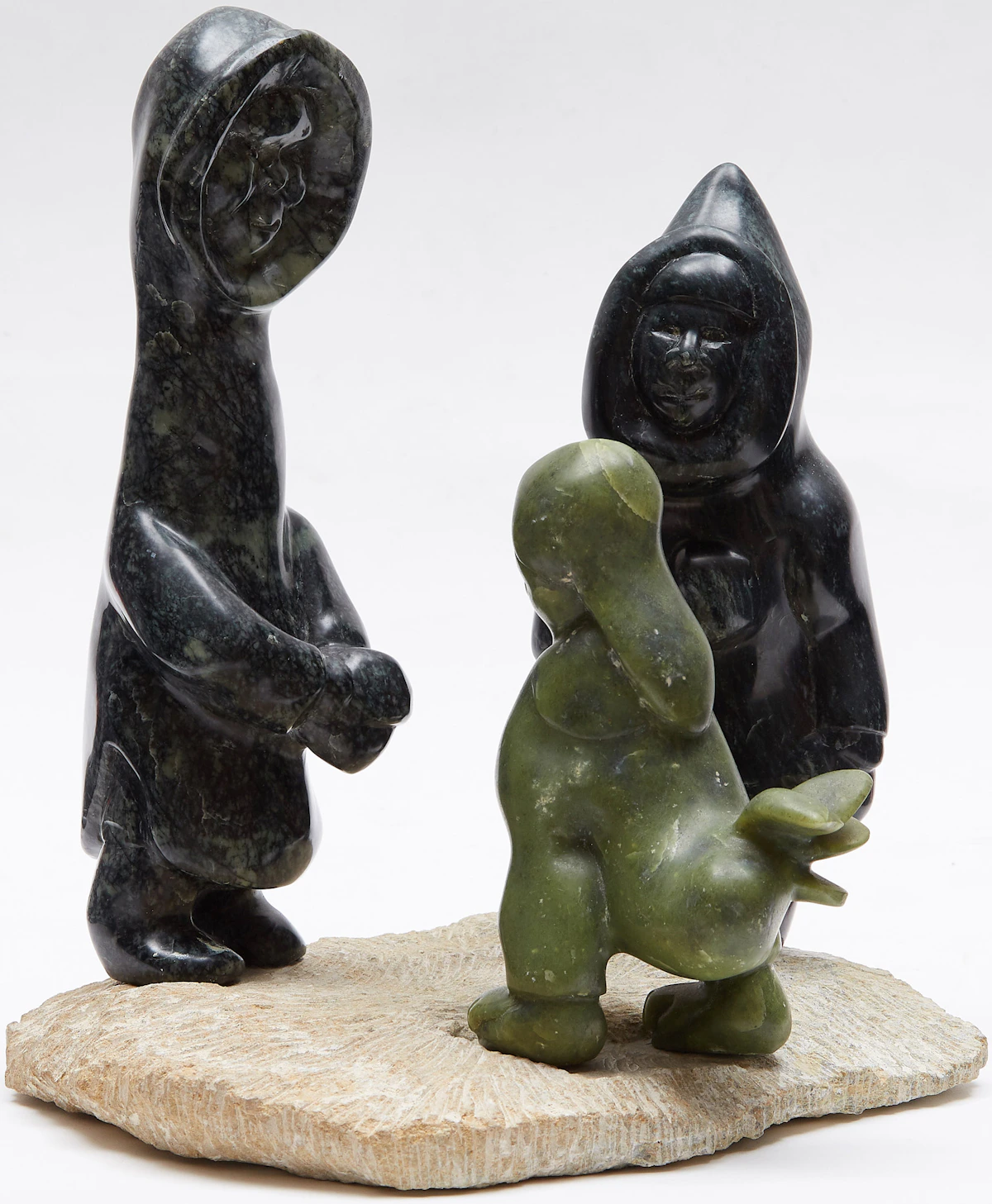 Tukiki Manomie, Three Figures, stone; wood