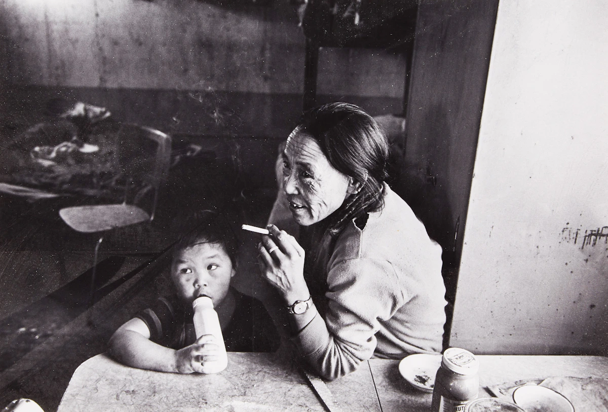 John Reeves, Inuit Woman and Child; Inuit Woman Carving and Child, two photographs