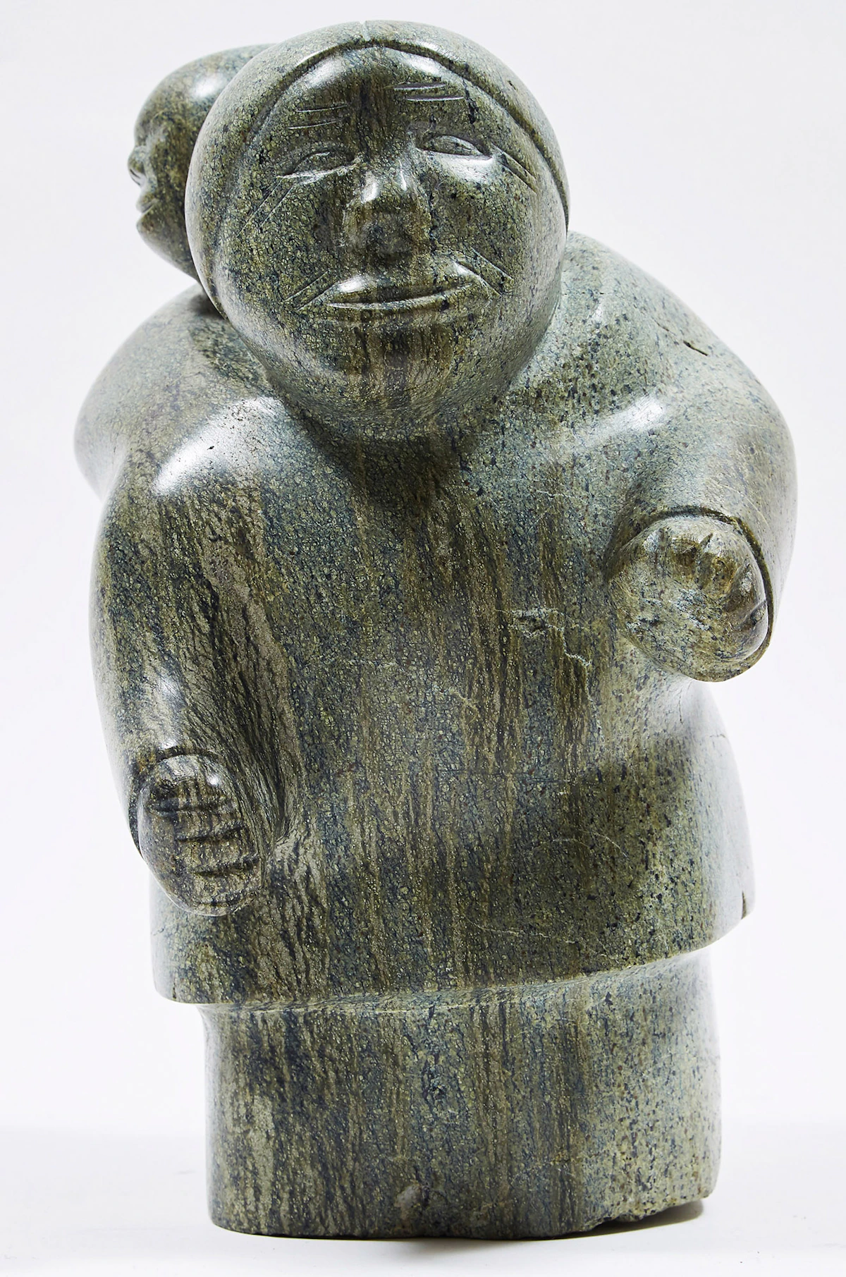 Unidentified Inuit Artist (Naujaat), Mother with Child in Amaut, stone