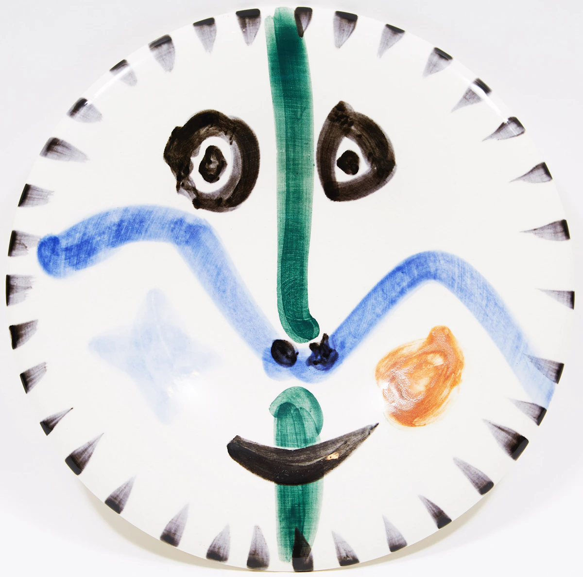 Pablo Picasso, Visage No. 111 (A. Ramié 746), white earthenware ceramic plate with coloured engobe and glaze, circa 1965