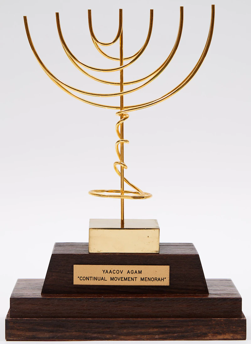 Yaacov Agam, Continual Movement Menorah, gold-plated brass