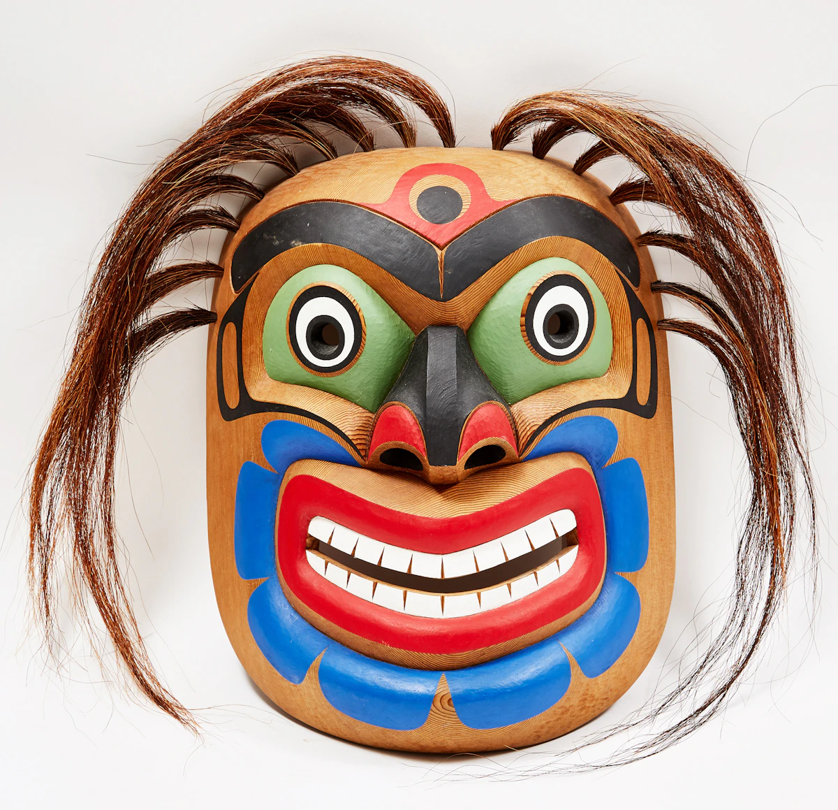 Tony Hunt (Jr.), Kwagiulth, Laughter Mask, painted and carved wood mask with hair inserts