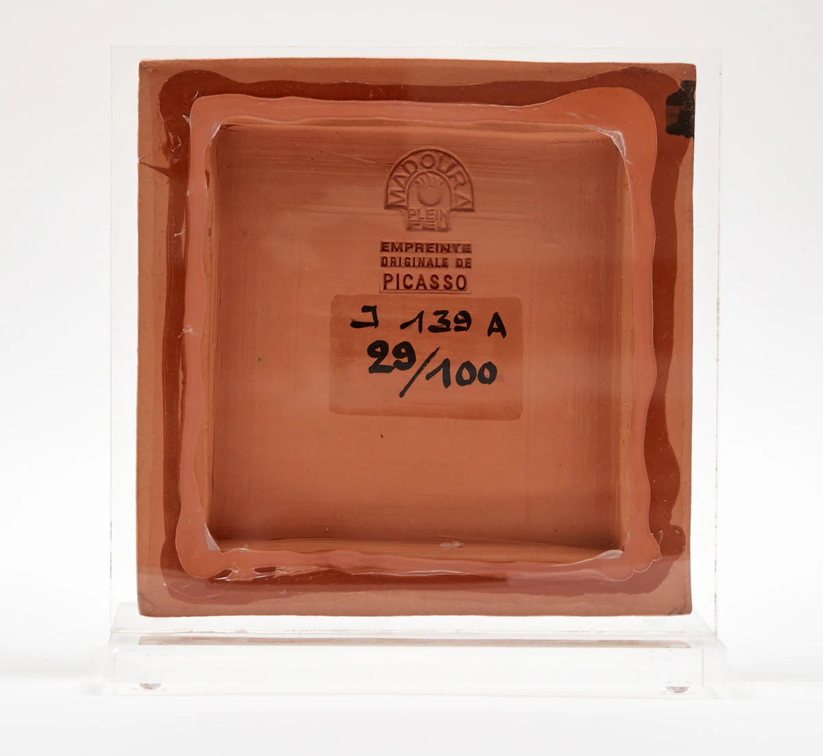 Pablo Picasso, Little Bearded Face (A.R. 557), partially glazed red earthenware clay plaque, 1969