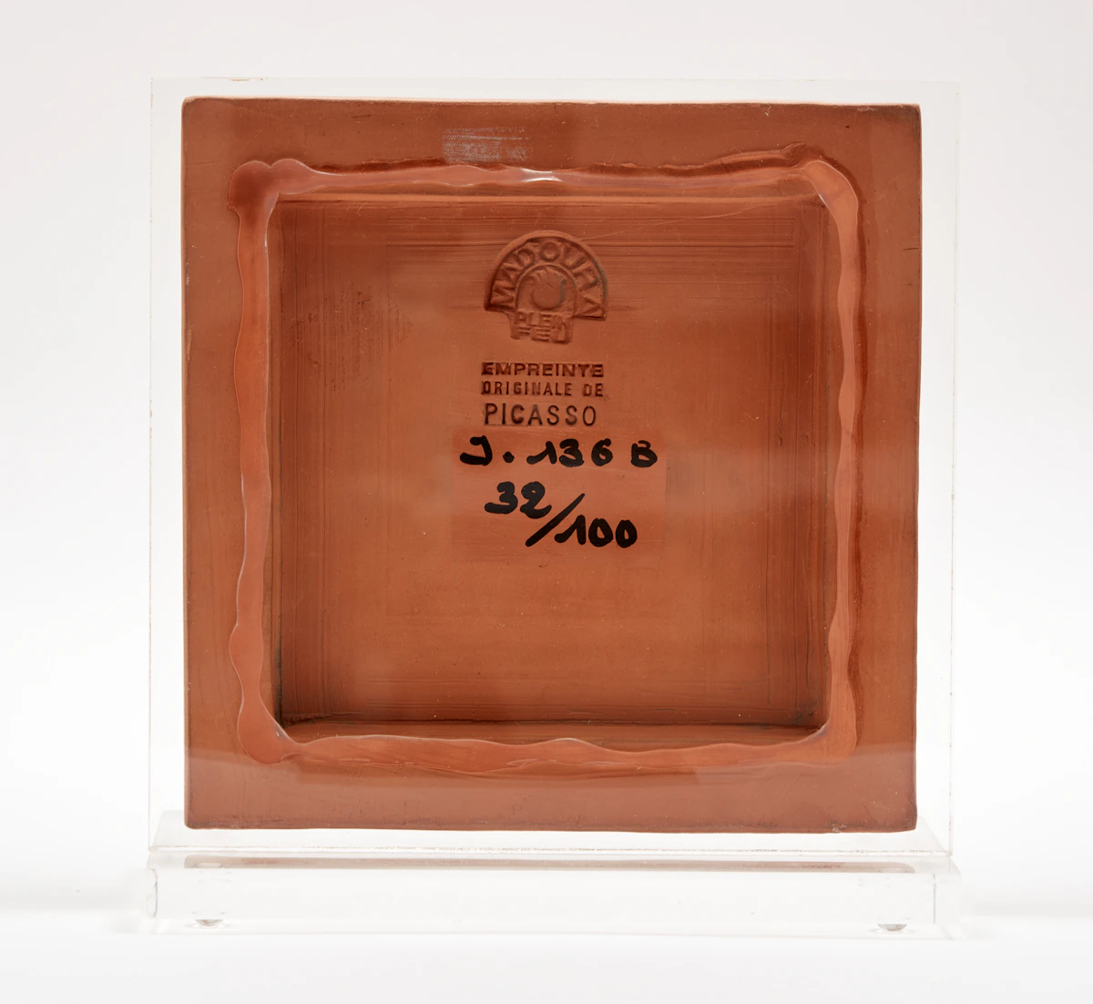 Pablo Picasso, Visage aux traits en X (A.R. 556), partially glazed red earthenware clay plaque, 1968