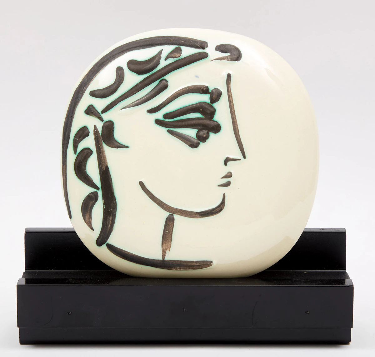 Pablo Picasso, Profil de Jacqueline (A.R. 383), white earthenware ceramic plaque with black oxide and white glaze, 1956